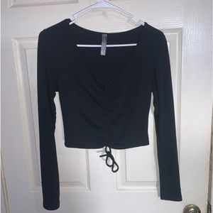Long sleeve shirt with drawstring